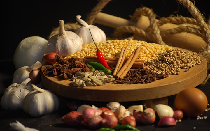 High quality image of beans with garlic and cinnamon sticks